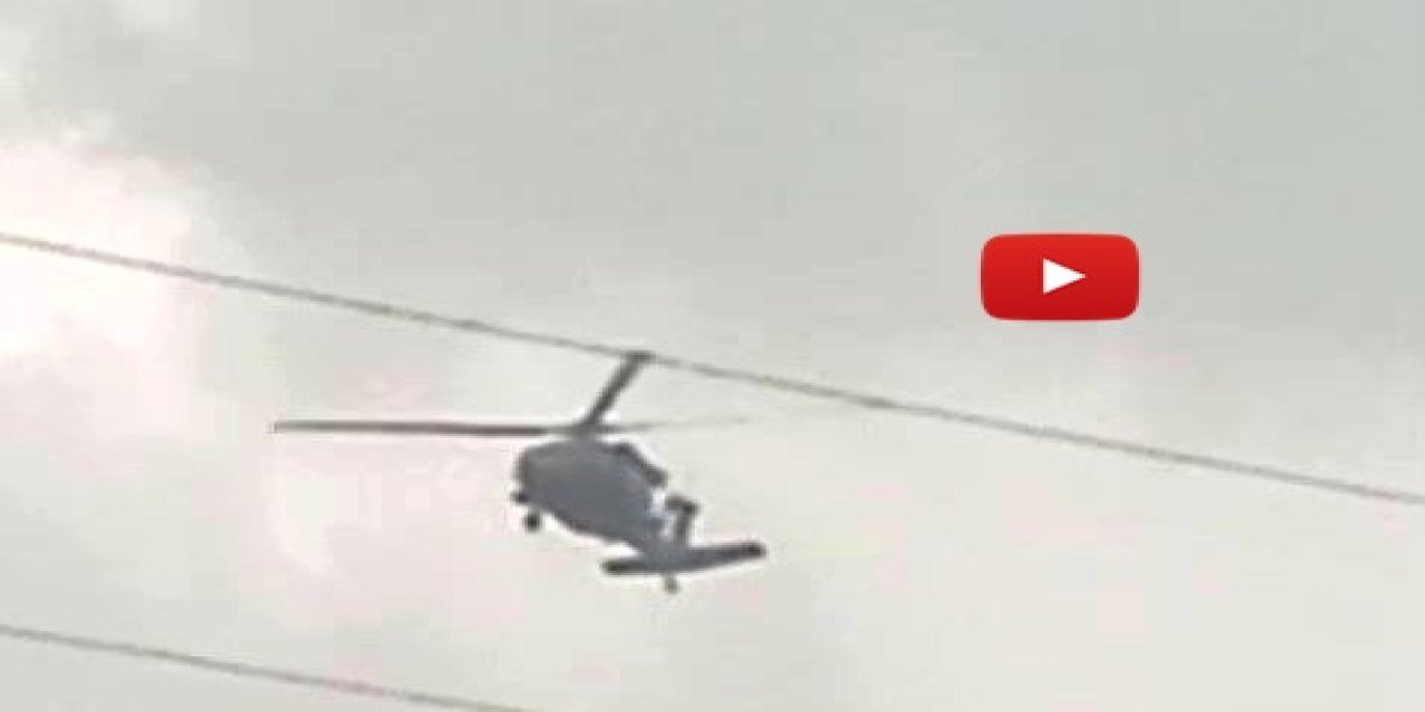 Askeri helikopter dolu ve yağmura yakalandı