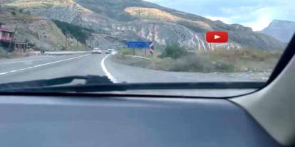 Erzurum'da spor araç mıcıra kapıldı, sürücü kazayı son anda atlattı